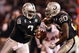 OAKLAND, CA - SEPTEMBER 8: Quarterback JaMarcus Russell #2 of the Oakland Raiders hands off the ball to Darren McFadden #20 during the NFL game against the Denver Broncos on September 8, 2008 at McAfee Coliseum in Oakland, California. The Broncos defeated the Raiders 41-14. (Photo by Jed Jacobsohn/Getty Images)