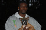 Michael-vick-with-dog_crop_150x100
