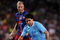 BARCELONA, SPAIN - AUGUST 19:  Carlos Tevez (R) of Manchester City duels for the ball with Eidur Gudjohnsen of Barcelona during the Joan Gamper Trophy match between Barcelona and Manchester City at the Camp Nou Stadium on August 19, 2009 in Barcelona, Spain.  (Photo by Jasper Juinen/Getty Images)