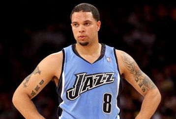 LOS ANGELES, CA - MAY 14:  Deron Williams #8 of the Utah Jazz looks across the court in Game Five of the Western Conference Semifinals against the Los Angeles Lakers during the 2008 NBA Playoffs on May 14, 2008 at Staples Center in Los Angeles, California.  NOTE TO USER: User expressly acknowledges and agrees that, by downloading and/or using this Photograph, user is consenting to the terms and conditions of the Getty Images License Agreement.  (Photo by Stephen Dunn/Getty Images)