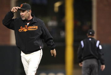 SAN FRANCISCO - AUGUST 10: Manager Bruce Bochy of the San Francisco Giants is thrown out of the game by umpire Bill Hohn for arguing a play in the fifth inning against the Los Angeles Dodgers during a Major League Baseball game at AT&T Park on August 10, 2009 in San Francisco, California. (Photo by Jed Jacobsohn/Getty Images)