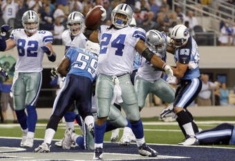 ARLINGTON, TX - AUGUST 21:  Running back Marion Barber #24 of the Dallas Cowboys celebrates in the first quarter after scoring against the Tennessee Titans during a preseason game at Cowboys Stadium on August 21, 2009 in Arlington, Texas. (Photo by Tom Pennington/Getty Images)