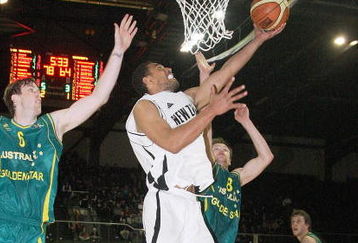 WELLINGTON, NEW ZEALAND - AUGUST 25:  Mika Vucona of the Tall Blacks jumps for a shot with Andrew Ogilvy and Brad Newley of the Boomers in defense during game two of the Ramsey Shield series between the Australian Boomers and the New Zealand Tall Blacks at TSB Bank Arena on August 25, 2009 in Wellington, New Zealand.  (Photo by Marty Melville/Getty Images)
