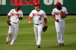 WASHINGTON - AUGUST 06:  Outfielders Nyjer Morgan #1, Josh Willingham #16 and Elijah Dukes #34 of the Washington Nationals celebrate as they head in from the outfield after they defeated the Florida Marlins at Nationals Park on August 6, 2009 in Washington, DC. The Nationals defeated the Marlins 12-8.  (Photo by Doug Pensinger/Getty Images)