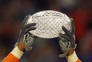 MIAMI - JANUARY 08:  Brandon Spikes #51 of the Florida Gators holds up the winning trophy after the FedEx BCS National Championship Game against the Oklahoma Sooners at Dolphin Stadium on January 8, 2009 in Miami, Florida.  (Photo by Eliot J. Schechter/Getty Images)