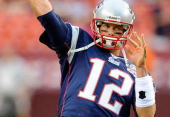 LANDOVER, MD - AUGUST 28:  Tom Brady #12 of the New England Patriots warms up before a preseason game against the Washington Redskins at FedExField on August 28, 2009 in Landover, Maryland.  (Photo by Greg Fiume/Getty Images)
