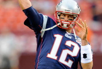 LANDOVER, MD - AUGUST 28:  Tom Brady #12 of the New England Patriots warms up before a preseason game against the Washington Redskins at FedExField on August 28, 2009 in Landover, Maryland.  (Photo by Greg Fiume/Getty Images)