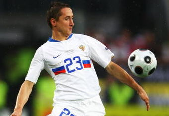 INNSBRUCK, AUSTRIA - JUNE 10: Vladimir Bystrov of Russia in action during the UEFA EURO 2008 Group D match between Spain and Russia at Stadion Tivoli Neu on June 10, 2008 in Innsbruck, Austria.  (Photo by Christof Koepsel/Getty Images)