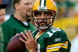 GREEN BAY, WI - AUGUST 15:  Quarterback Aaron Rodgers #12 of the Green Bay Packers warms up before taking on the Cleveland Browns during the preseason game at Lambeau Field on August 15, 2009 in Green Bay, Wisconsin.  (Photo by Jonathan Daniel/Getty Images)