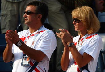 NEW YORK - SEPTEMBER 09:  Srdjan and Dijana Djokovic, the father and mother of Novak Djokovic of Serbia applaud as their son plays against Roger Federer of Switzerland during the Men's Singles Final on day fourteen of the 2007 U.S. Open in Arthur Ashe Stadium at the Billie Jean King National Tennis Center on September 9, 2007 in the Flushing neighborhood of the Queens borough of New York City.  (Photo by Clive Brunskill/Getty Images)