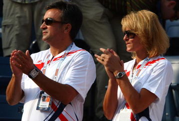 NEW YORK - SEPTEMBER 09:  Srdjan and Dijana Djokovic, the father and mother of Novak Djokovic of Serbia applaud as their son plays against Roger Federer of Switzerland during the Men's Singles Final on day fourteen of the 2007 U.S. Open in Arthur Ashe Stadium at the Billie Jean King National Tennis Center on September 9, 2007 in the Flushing neighborhood of the Queens borough of New York City.  (Photo by Clive Brunskill/Getty Images)