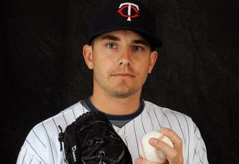 FORT MYERS, FL - FEBRUARY 23: Brian Duensing #52 of the Minnesota Twins poses during photo day at the Twins spring training complex on February 23, 2008 in Fort Myers, Florida. (Photo by Rob Tringali/Getty Images)