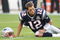 PHILADELPHIA - AUGUST 13:  Quarterback Tom Brady #12 of the New England Patriots looks on during warmups before the preseason game against the Philadelphia Eagles on August 13, 2009 at Lincoln Financial Field in Philadelphia, Pennsylvania. (Photo by Jim McIsaac/Getty Images)