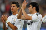MADRID, SPAIN - AUGUST 24:  Kaka (R) of Real Madrid applauds flanked by his teammate Cristiano Ronaldo during the Santiago Bernabeu Trophy match between Real Madrid and Rosenborg at the Santiago Bernabeu stadium on August 24, 2009 in Madrid, Spain.  (Photo by Jasper Juinen/Getty Images)