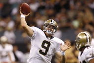 NEW ORLEANS - AUGUST 14:  Quarterback Drew Brees #9 of the New Orleans Saints throws a touchdown pass to tight end Jeremy Shockey (not pictured) during a preseason game against the Cincinnati Bengals on August 14, 2009 at the Superdome in New Orleans, Louisiana. (Photo by Chris Graythen/Getty Images)