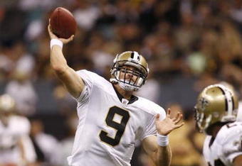 NEW ORLEANS - AUGUST 14:  Quarterback Drew Brees #9 of the New Orleans Saints throws a touchdown pass to tight end Jeremy Shockey (not pictured) during a preseason game against the Cincinnati Bengals on August 14, 2009 at the Superdome in New Orleans, Louisiana. (Photo by Chris Graythen/Getty Images)