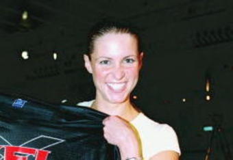12 Jul 2000: Stephanie McMahon poses with a XFL jersey during the XFL Press Conference at the House of Blues in Los Angeles, California.Mandatory Credit: Tom Hauck  /Allsport
