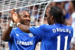 LONDON, ENGLAND - AUGUST 29:  Nicolas Anelka of Chelsea celebrates scoring the opening goal with teammate Didier Drogba during the Barclays Premier League match between Chelsea and Burnley at Stamford Bridge on August 29, 2009 in London, England.  (Photo by Phil Cole/Getty Images)