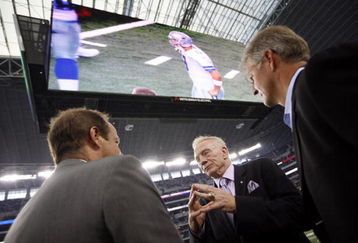 ARLINGTON, TX - AUGUST 21:  Dallas Cowboys team owner Jerry Jones (center) talks with two unidentified individuals prior to a preseason game at Dallas Cowboys Stadium on August 21, 2009 in Arlington, Texas. (Photo by Tom Pennington/Getty Images) 