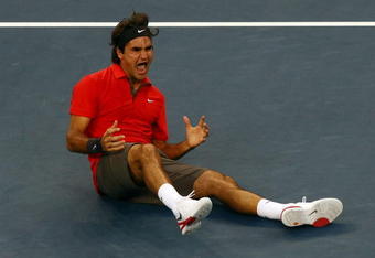 NEW YORK - SEPTEMBER 08:  Roger Federer of Switzerland reacts after defeating Andy Murray of the United Kingdom to win the 2008 U.S. Open Men's Championship Match in Arthur Ashe Stadium at the USTA Billie Jean King National Tennis Center on September 8, 2008 in the Flushing neighborhood of the Queens borough of New York City.  (Photo by Chris McGrath/Getty Images)