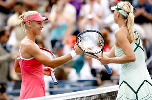TORONTO, ON - AUGUST 23:  Elena Dementieva of Russia is congratulated by Maria Sharapova of Russia after their match at the Rogers Cup at the Rexall Center on August 23, 2009 in Toronto, Ontario, Canada.  (Photo by Matthew Stockman/Getty Images)