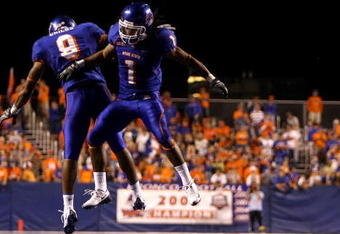 BOISE , ID - SEPTEMBER 13: Kyle Wilson #1 of the Boise State Broncos celebrates with teammate Jeremy Childs #9 after making an interception against the Bowling Green Falcons at Bronco Stadium on September 13, 2008 in Boise, Idaho. (Photo by Jonathan Ferrey/Getty Images)