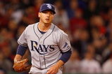 BOSTON - APRIL 8: Scott Kazmir #19 of the Tampa Bay Rays watches the flight of a hit ball against the Boston Red Sox at Fenway Park, April 8, 2009, in Boston, Massachusetts. (Photo by Jim Rogash/Getty Images)