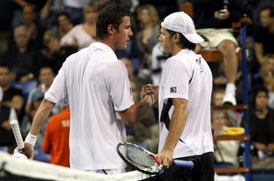 LOS ANGELES, CA - JULY 31: (L-R) Marat Safin of Russia and Tommy Haas of Germany meet at the net after the match on Day 5 of the LA Tennis Open at the Los Angeles Tennis Center - UCLA on July 31, 2009 in Los Angeles, California. (Photo by Stephen Dunn/Getty Images)
