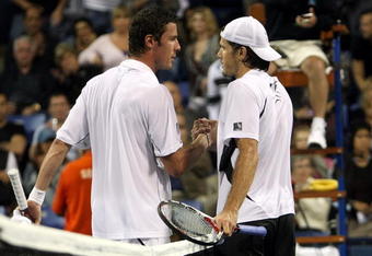 LOS ANGELES, CA - JULY 31: (L-R) Marat Safin of Russia and Tommy Haas of Germany meet at the net after the match on Day 5 of the LA Tennis Open at the Los Angeles Tennis Center - UCLA on July 31, 2009 in Los Angeles, California. (Photo by Stephen Dunn/Getty Images)
