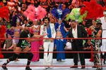 LAS VEGAS - AUGUST 24:  (L-R) Wrestler Triple H, an Elvis Presley impersonator, World Wrestling Entertainment Inc. Chairman Vince McMahon and wrestler Shawn Michaels appear in the ring with showgirls during McMahon's 64th birthday celebration during the WWE Monday Night Raw show at the Thomas & Mack Center August 24, 2009 in Las Vegas, Nevada.  (Photo by Ethan Miller/Getty Images)