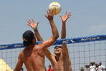 MANHATTAN BEACH, CA - JULY 18: Todd Rogers trys to hit a shot palst the block of Matt Fuerbringer at the AVP Crocs Manhattan Beach Open on July 18, 2009 in Manhattan Beach, California. Phil Dalhausser/Todd Rogers  defeated Matt Fuerbringer/Casey Jennings 21-23, 21-18, (Photo by Stephen Dunn/Getty Images)