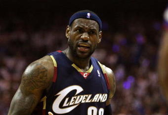 ORLANDO, FL - MAY 30:  LeBron James #23 of the Cleveland Cavaliers reacts after a play against the Orlando Magic in Game Six of the Eastern Conference Finals during the 2009 Playoffs at Amway Arena on May 30, 2009 in Orlando, Florida. NOTE TO USER: User expressly acknowledges and agrees that, by downloading and or using this photograph, User is consenting to the terms and conditions of the Getty Images License Agreement  (Photo by Elsa/Getty Images)