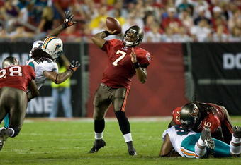 TAMPA, FL - AUGUST 27:  Quarterback Byron Leftwich #7 of the Tampa Bay Buccaneers throws a pass against the Miami Dolphins during a preseason game at Raymond James Stadium on August 27, 2009 in Tampa, Florida.  (Photo by J. Meric/Getty Images)
