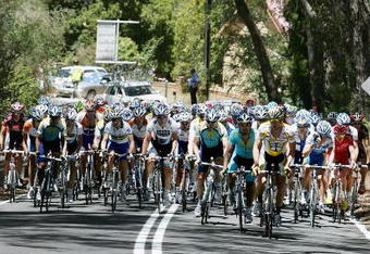 ADELAIDE, AUSTRALIA - JANUARY 21:  The peloton rides through Aldgate during stage two of the 2009 Tour Down Under at Hanhdorf to Stirling on January 21, 2009 in Adelaide, Australia.  (Photo by James Knowler/Getty Images)