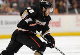 ANAHEIM, CA - MAY 07:  Andrew Ebbett #48 of the Anaheim Ducks skates up ice with the puck in Game Four of the Western Conference Semifinals against the Detroit Red Wings at Honda Center on May 7, 2009 in Anaheim, California.  The Red Wings won 6-3.  (Photo by Harry How/Getty Images)
