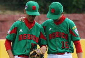 WILLIAMSPORT, PA - AUGUST 24:  Centerfielder Sergio Rodriguez #15 of Mexico is consoled by teammate Eduardo Rodriguez #16 after Sergio was relieved at pitcher in the third inning while taking on the United States during the Little League World Series Championship game at Lamade Stadium on August 24, 2008 in Williamsport, Pennsylvania. The United States defeated Mexico 12-3.  (Photo by Doug Benc/Getty Images)