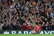 MANCHESTER, UNITED KINGDOM - AUGUST 29: Wayne Rooney of Manchester United celebrates scoring his team's first goal during the Barclays Premier League match between Manchester United and Arsenal at Old Trafford on August 29, 2009 in Manchester, England. (Photo by Laurence Griffiths/Getty Images)