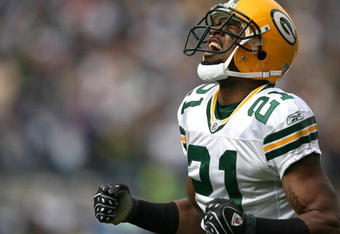 SEATTLE - OCTOBER 12:  Cornerback Charles Woodson #21 of the Green Bay Packers reacts after just missing an interception in the first half against the Seattle Seahawks on October 12, 2008 at Qwest Field in Seattle, Washington. The Packers defeated the Seahawks 27-17. (Photo by Otto Greule Jr/Getty Images)