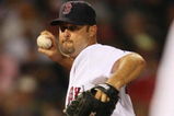 BOSTON - AUGUST 26:  Starting pitcher Tim Wakefield #49 of the Boston Red Sox throws to first base in the fourth inning during the game against the Chicago White Sox on August 26, 2009 at Fenway Park in Boston, Massachusetts. (Photo by: Elsa/Getty Images)