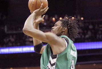 CHARLOTTE, NC - MARCH 16:  Chris Bosh #4 of the Toronto Raptors makes a jumpshot against the Charlotte Bobcats during their game at Time Warner Cable Arena on March 16, 2009 in Charlotte, North Carolina.  NOTE TO USER: User expressly acknowledges and agrees that, by downloading and/or using this Photograph, user is consenting to the terms and conditions of the Getty Images License Agreement. (Photo by: Streeter Lecka/Getty Images)