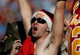 LOS ANGELES - DECEMBER 1:  Fans of the USC Trojans cheer during the college football game against the UCLA Bruins at the Los Angeles Memorial Coliseum December 1, 2007 in Los Angeles, California.  (Photo by Jeff Gross/Getty Images)