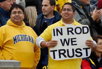 ANN ARBOR, MI - OCTOBER 25:  Fans of the Michigan Wolverines watch from the stands during the game against the Michigan State Spartans on October 25, 2008 at Michigan Stadium in Ann Arbor, Michigan. Michigan State won the game 35-21. (Photo by Gregory Shamus/Getty Images)