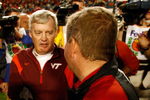 MIAMI - JANUARY 01:  Head coach Brian Kelly (R) of the Cincinnati Bearcats shakes hands with Head coach Frank Beamer of the Virginia Tech Hokies after the FedEx Orange Bowl at Dolphin Stadium on January 1, 2009 in Miami, Florida.  (Photo by Streeter Lecka/Getty Images)