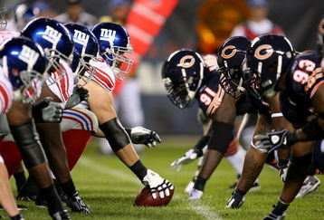 CHICAGO - AUGUST 22: The offensive line of the New York Giants waits to take on the defensive line of the Chicago Bears during a pre-season game on August 22, 2009 at Soldier Field in Chicago, Illinois. The Bears defeated the Giants 17-3. (Photo by Jonathan Daniel/Getty Images)