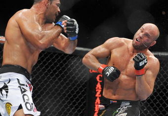 PORTLAND, OR - AUGUST 29:  UFC fighter Antonio Nogueira (L) battles UFC fighter Randy Couture (R) during their Heavyweight bout at UFC 102:  Couture vs. Nogueira at the Rose Garden Arena on August 29, 2009 in Portland, Oregon.  (Photo by Jon Kopaloff/Getty Images)