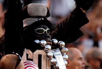 OAKLAND, CA - AUGUST 13:  An Oakland Raiders fan dressed in a gorilla outfit cheers on the Raiders against the Dallas Cowboys during the preseason game at Oakland-Alameda County Coliseum on August 13, 2009 in Oakland, California. (Photo by Jed Jacobsohn/Getty Images)