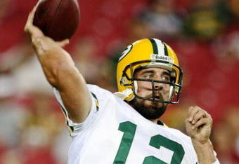 GLENDALE, AZ - AUGUST 28:  Quarterback Aaron Rodgers #12 of the Green Bay Packers warms up prior to the game against the Arizona Cardinals at the University of Phoenix Stadium on August 28, 2009 in Glendale, Arizona.  (Photo by Christian Petersen/Getty Images)