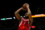 MILWAUKEE - FEBRUARY 09: Tracy McGrady #1 of the Houston Rockets puts up a shot over Keith Bogans #10 of the Milwaukee Bucks on February 9, 2009 at the Bradley Center in Milwaukee, Wisconsin. The Bucks defeated the Rockets 124-112. NOTE TO USER: User expressly acknowledges and agreees that, by downloading and/or using this Photograph, User is consenting to the terms and conditions of the Getty Images License Agreement. (Photo by Jonathan Daniel/Getty Images)