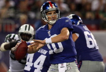 EAST RUTHERFORD, NJ - AUGUST 29:  Eli Manning #10 of the New York Giants looks to throw a pass against the New York Jets on August 29, 2009 at Giants Stadium in East Rutherford, New Jersey.  (Photo by Jim McIsaac/Getty Images)