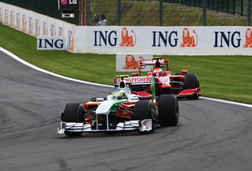 SPA FRANCORCHAMPS, BELGIUM - AUGUST 30:  Giancarlo Fisichella of Italy and Force India leads from Kimi Raikkonen of Finland and Ferrari during the Belgian Grand Prix at the Circuit of Spa Francorchamps on August 30, 2009 in Spa Francorchamps, Belgium.  (Photo by Mark Thompson/Getty Images)